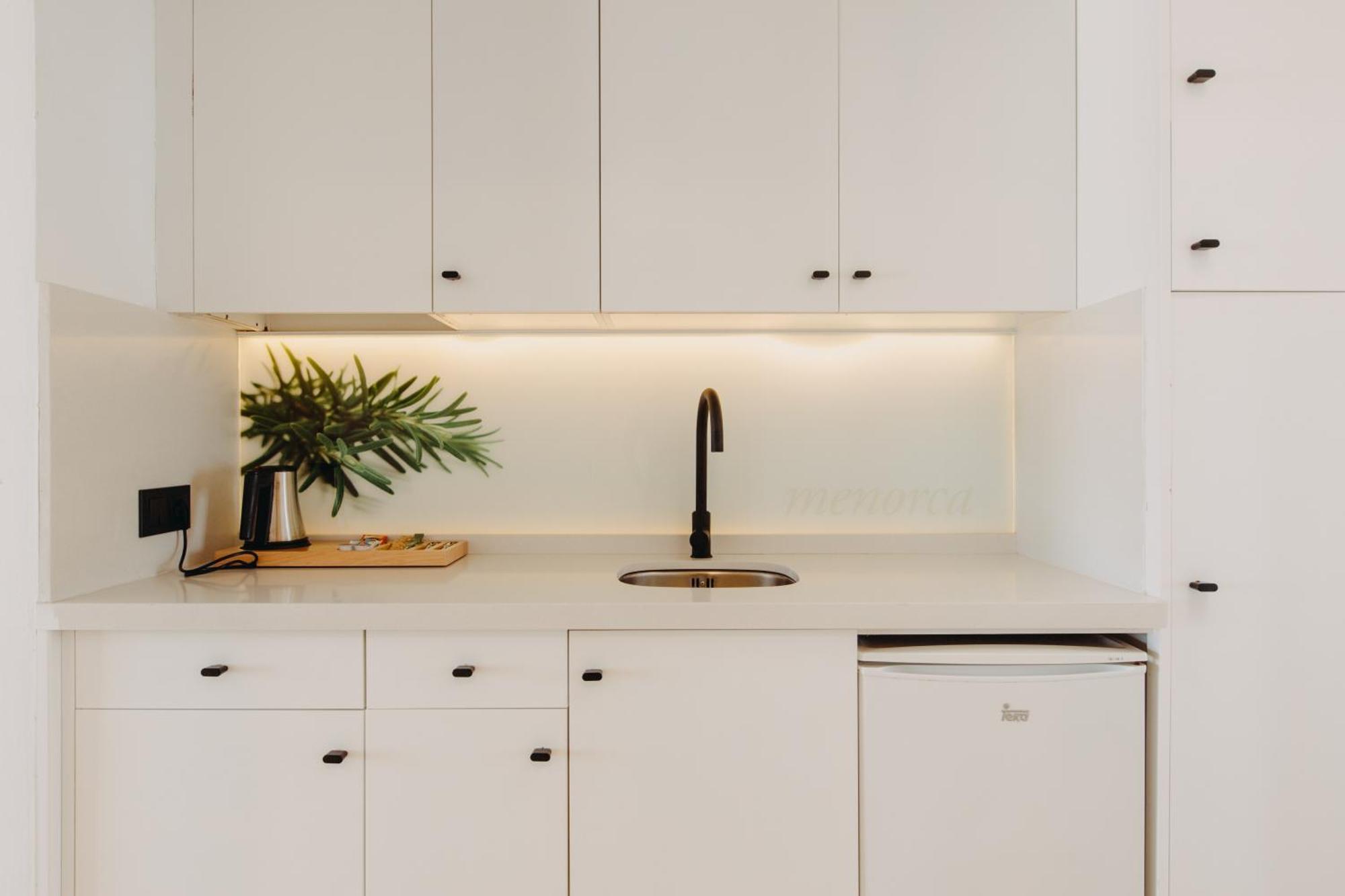 Lago Resort Menorca - Casas Del Lago Adults Only Cala en Bosch Esterno foto A kitchen with a single-control tap